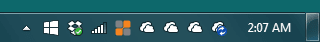 Windows taskbar now showing four OneDrive cloud icons in the notification area