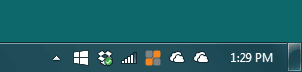 Windows taskbar with two identical OneDrive cloud icons in the notification area